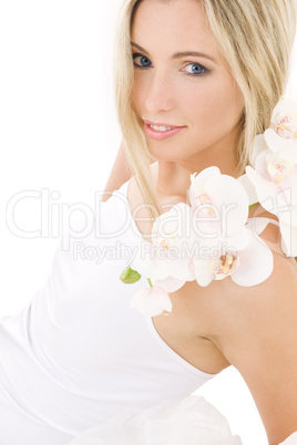 blonde in cotton underwear with orchid