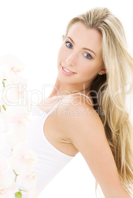blonde in cotton underwear with orchid
