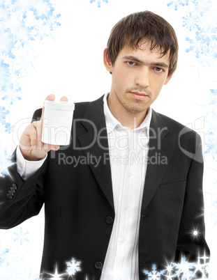 confident man showing blank medication container