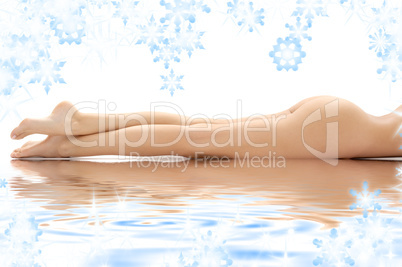 long legs of relaxed lady in water
