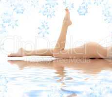 long legs of relaxed lady in water