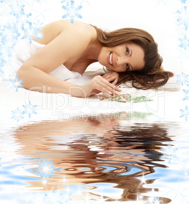 happy brunette on white sand