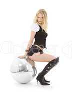 go-go dancer in high boots with disco ball