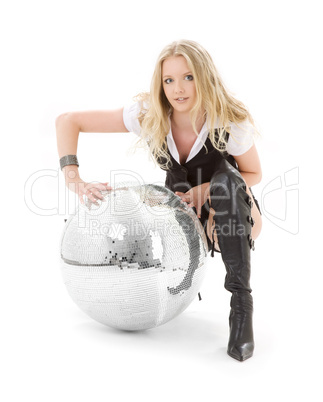 go-go dancer in high boots with disco ball