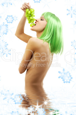 green hair girl with a bunch of grapes in water