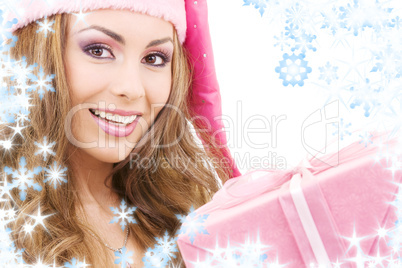 cheerful santa helper girl with gift box