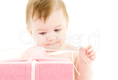 baby boy with big gift box