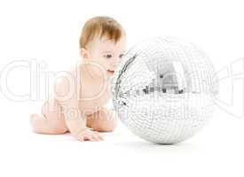 adorable baby boy with big disco ball