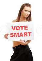 lovely girl holding vote smart board