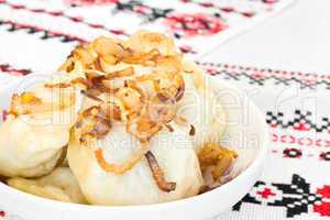 Close-up of Ukrainian dumplings with onion