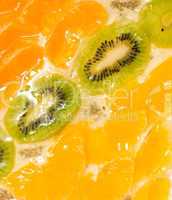 Sliced kiwi, orange and mandarin segments