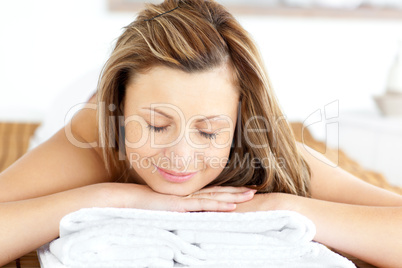 Delighted young woman having a back massage