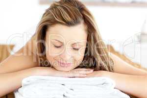 Delighted young woman having a back massage