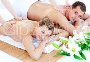 Caucasian young couple enjoying a back massage