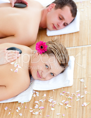 Relaxed young couple enjoying a back massage