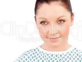 Portrait of a serious female patient smiling at the camera