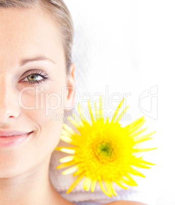 Portrait of a radiant young woman lying on a massage table