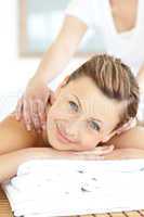 Beautiful young woman enjoying a back massage