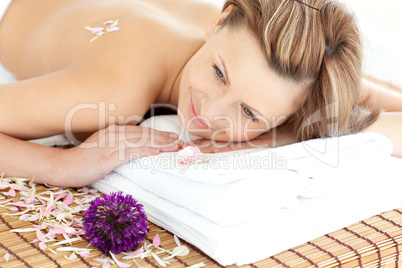 Relaxed young woman enjoying a back massage