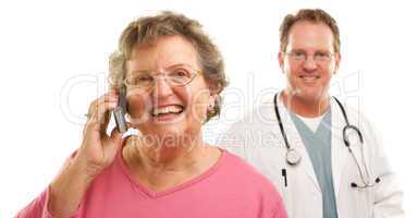 Happy Senior Woman Using Cell Phone with Male Doctor Behind