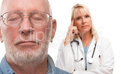 Concerned Senior Man and Female Doctor Behind