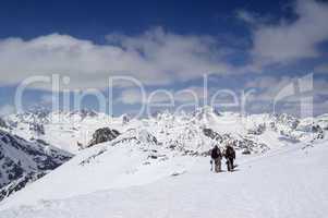 Two snowboarders on the ski resort