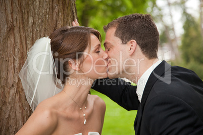 Bride and groom kissing