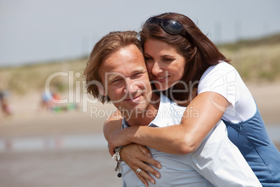 Young couple by the beach