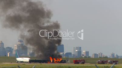 airport fire training, plane takeoff through frame