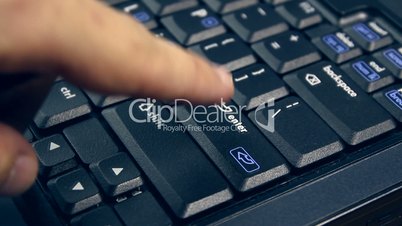 HD: Man’s finger Typing “Enter” key