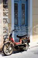 Old moped bike in a Greek village