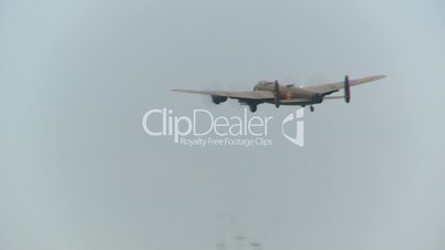 aircraft, WWII Lancaster bomber off in the wild blue