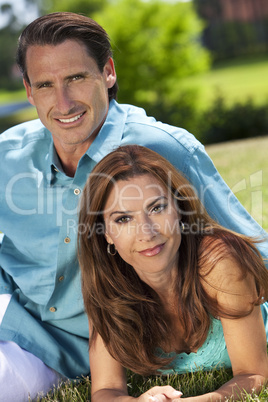 Happy Middle Aged Man and Woman Couple Outside Smiling