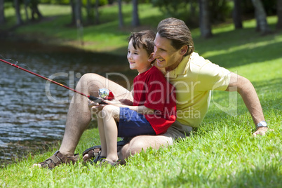 Father Fishing With His Son On A RIver