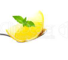 Zitrone auf Loeffel/ lemon on spoon