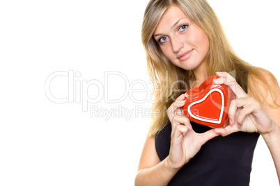 Smiling Young Woman Holding a Heart