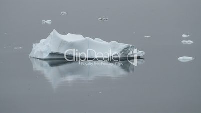 Iceberg lying in calm waters