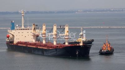 Cargo ship leaves port (Full HD)