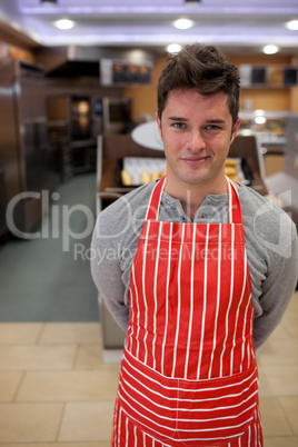 Confident cook smiling at the camera