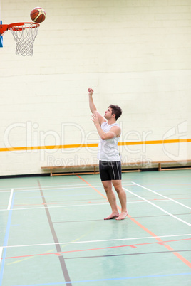 man playing basketball