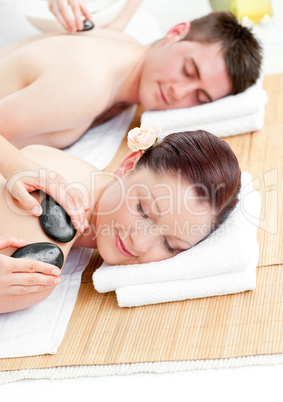 couple receiving a back massage