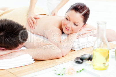 Caucasian young couple receiving a back massage