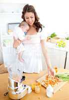 Caring young mother preparing vegetables for her baby in the kit