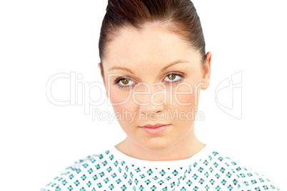 Portrait of a sad female patient smiling at the camera