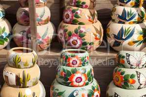 Variety of Colorfully Painted Ceramic Pots.