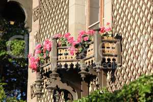 Wood balcony with beautiful pink flowers