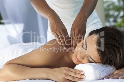 Woman At Health Spa Having Relaxing Massage