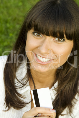 Young woman with credit card