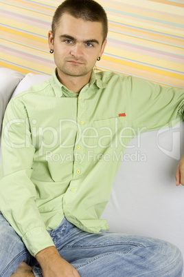 young man sitting on the couch