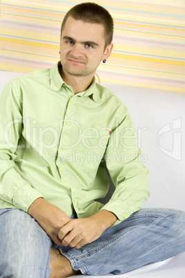 young man sitting on the couch